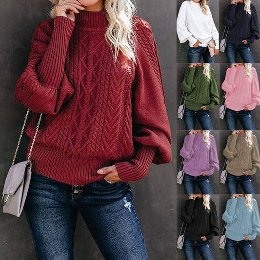 Pull en maille épaisse pour femmes avec col montant et manches volumineuses