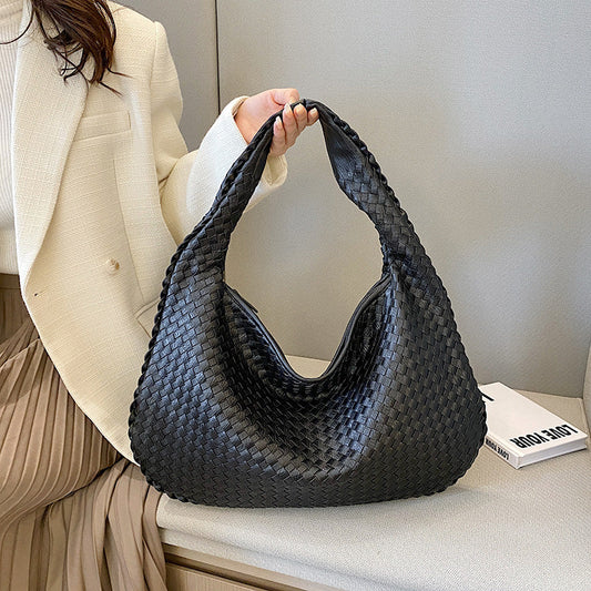 Sac avec structure tissée et fermeture à glissière