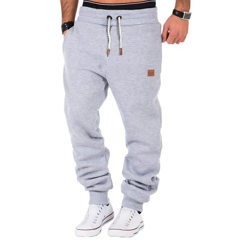 Løstsiddende joggingbukser med snøre og elastiske benkanter