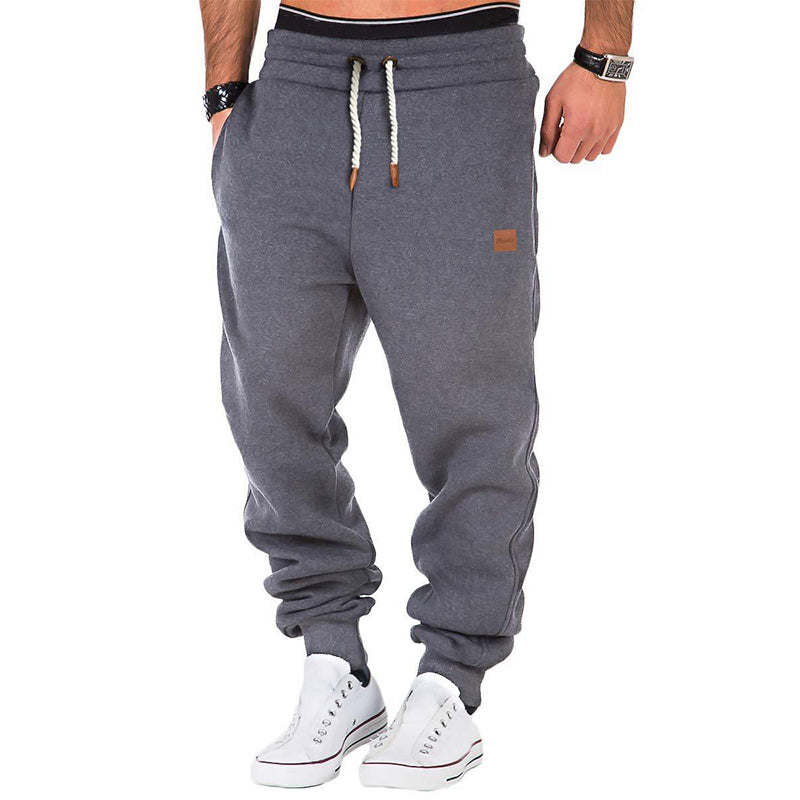 Løstsiddende joggingbukser med snøre og elastiske benkanter