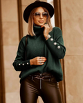 Women's high neck knit sweater with button details on the sleeves