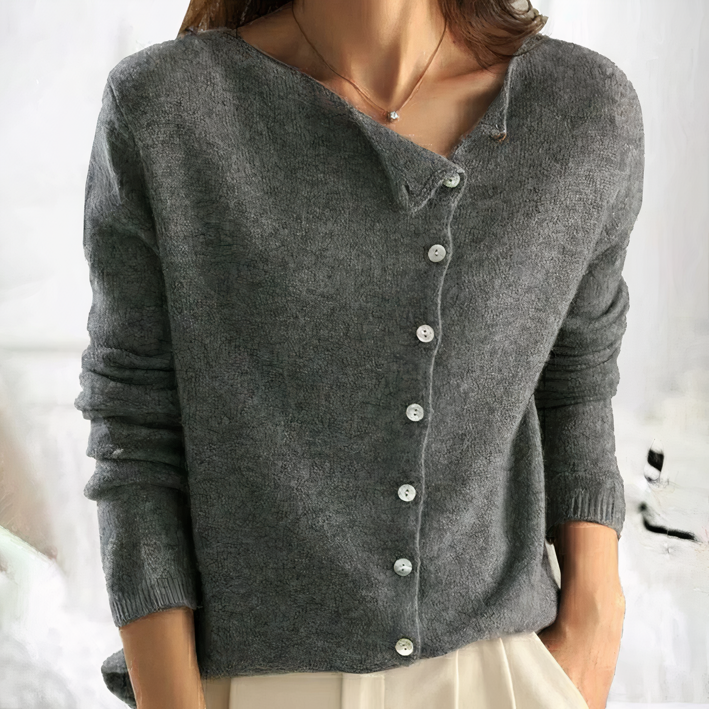 Women's V-neck cardigan with slanted button closure