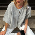 Women's short-sleeved round neck cardigan with front button closure