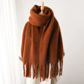 Luxurious women's cashmere scarf with large tassels for winter style and comfort