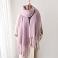 Luxurious women's cashmere scarf with large tassels for winter style and comfort