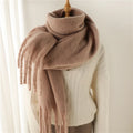 Luxurious women's cashmere scarf with large tassels for winter style and comfort