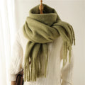 Luxurious women's cashmere scarf with large tassels for winter style and comfort