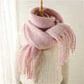 Luxurious women's cashmere scarf with large tassels for winter style and comfort