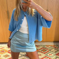 Women's short-sleeved round neck cardigan with front button closure