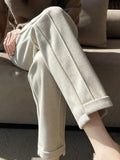 Tweed high waisted wool pencil trousers