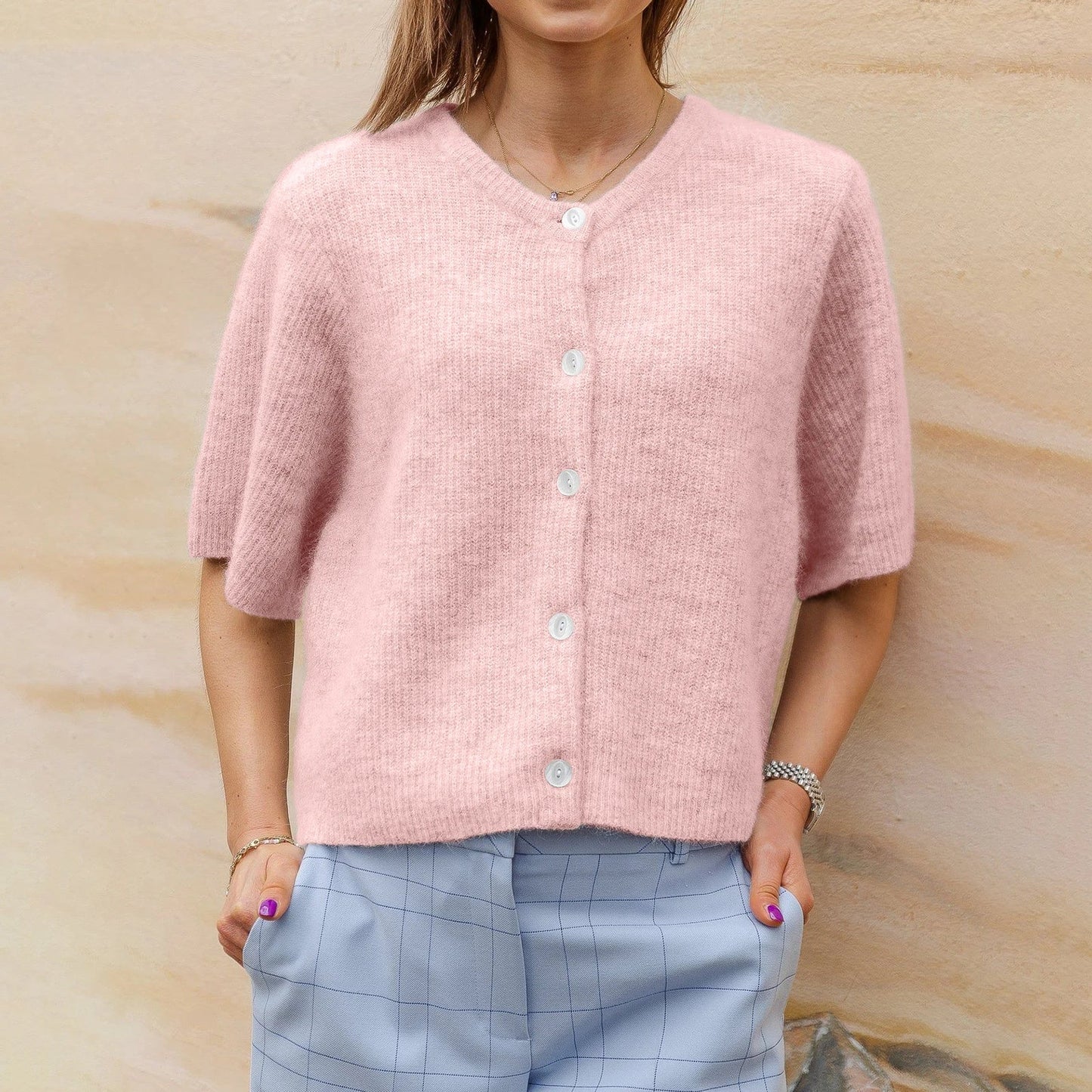 Women's short-sleeved round neck cardigan with front button closure