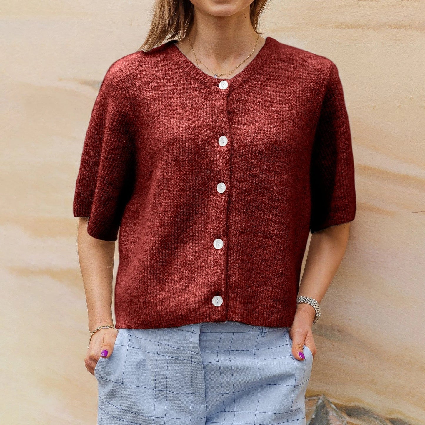 Women's short-sleeved round neck cardigan with front button closure